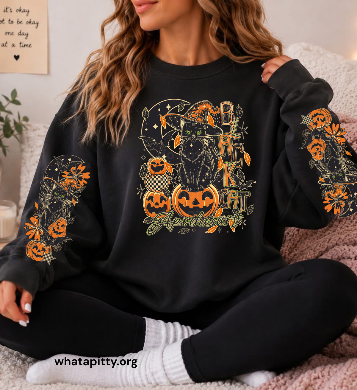 Black Cat Apothecary sweatshirt with sleeve designs