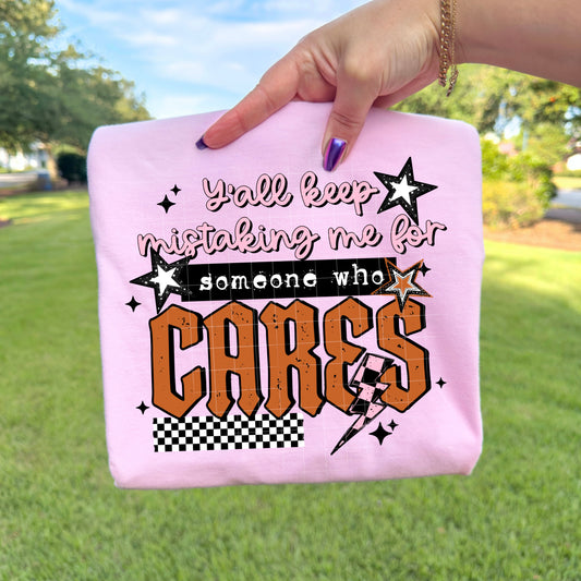 Ya'll keep mistaking me for someone who cares tee (Black Ink)