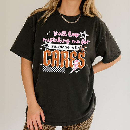 Ya'll keep mistaking me for someone who cares tee (White Ink)