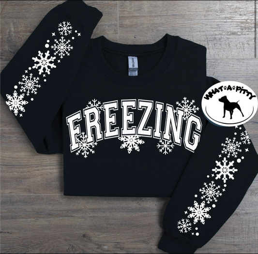 Freezing sweatshirt with snowflake sleeve designs