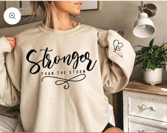 STRONGER than the Storm sweatshirt with sleeve design