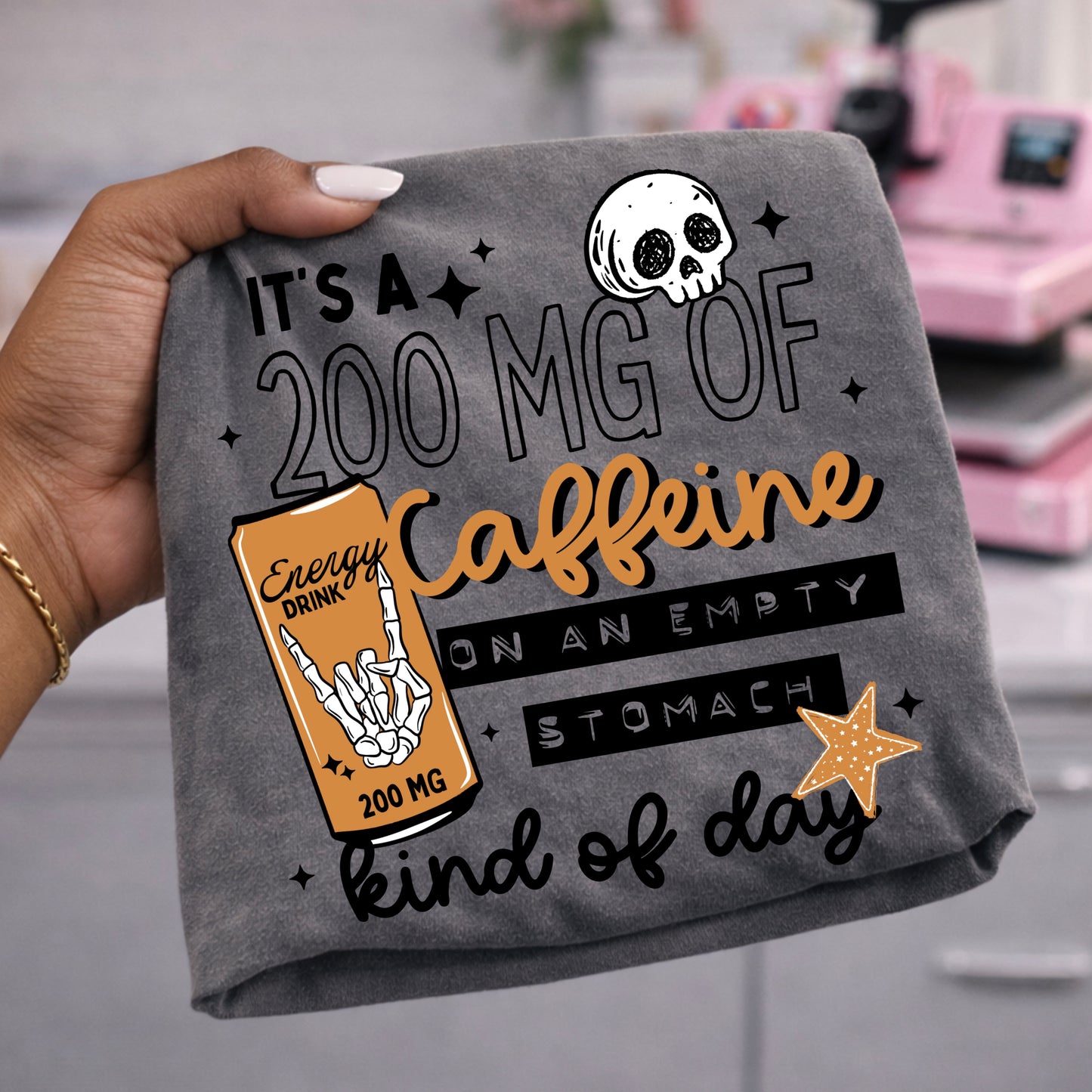 It's a 200 mg of caffeine kind of day tee (Black Ink)