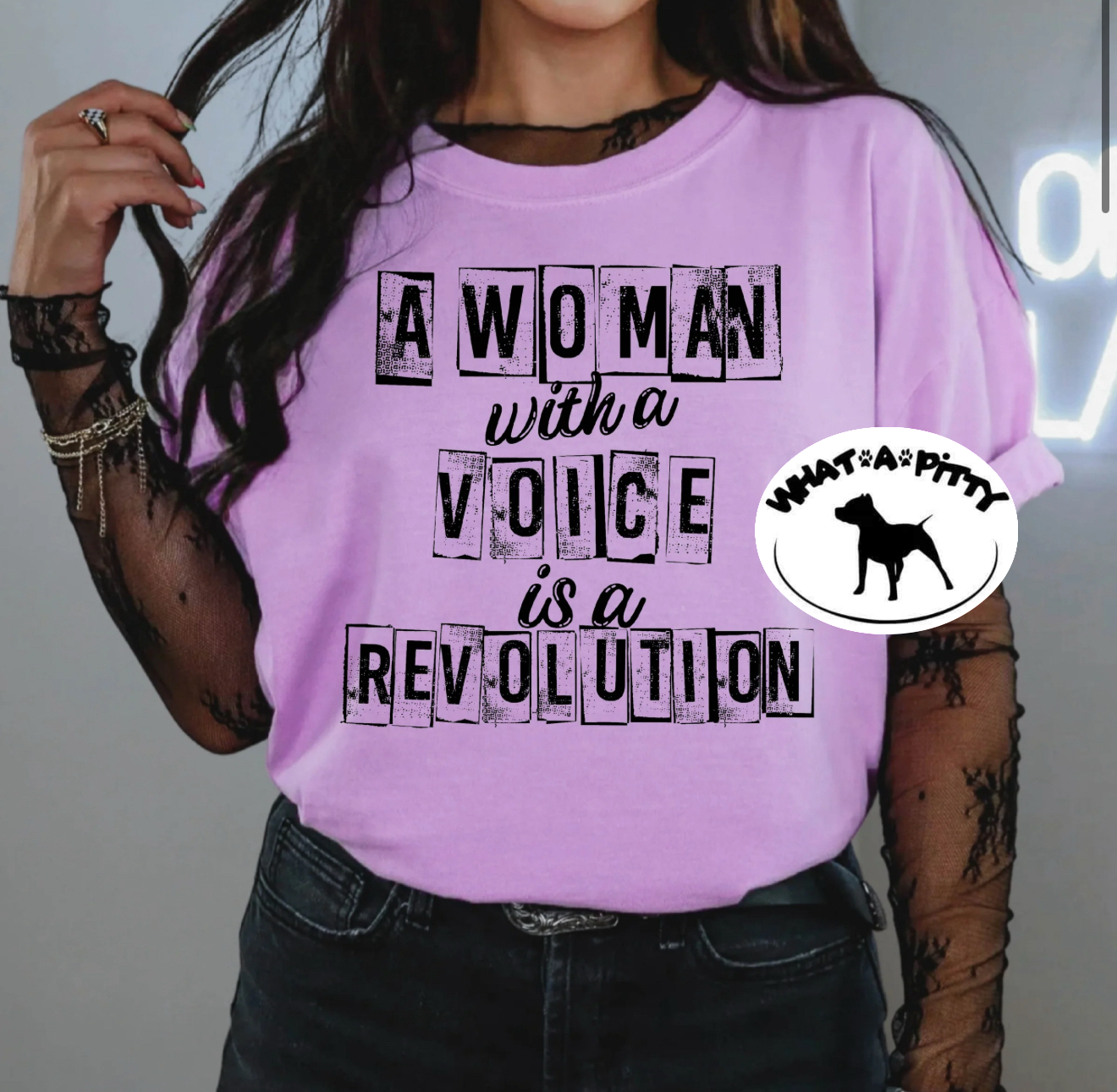 A woman with a voice is a revolution tee