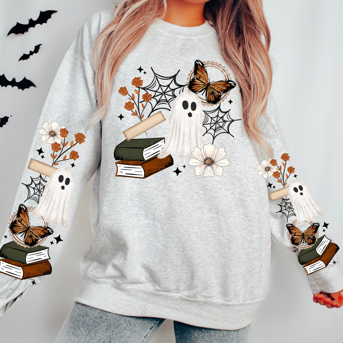 Spooky Reader sweatshirt with sleeve designs