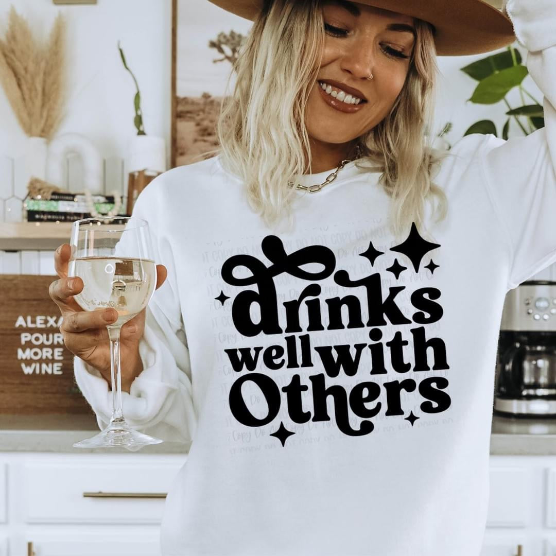 Drinks well with others tee